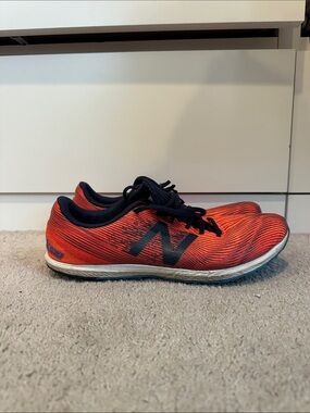 New Balance Women’s Orange and Black Track Spikes